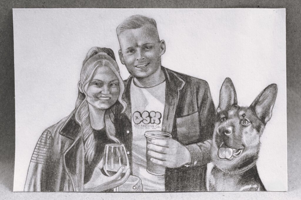 A pencil drawing featuring a young woman and a young man posing together, with the woman holding a wine glass and the man holding a cup. Beside them is a German Shepherd dog, all depicted with detailed shading and lifelike expressions.