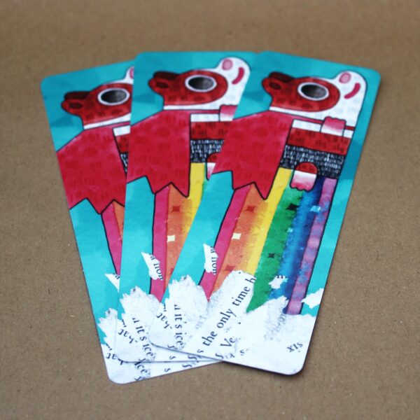 Fun bookmarks showcasing Super Poppy, the guinea pig, farting a rainbow.