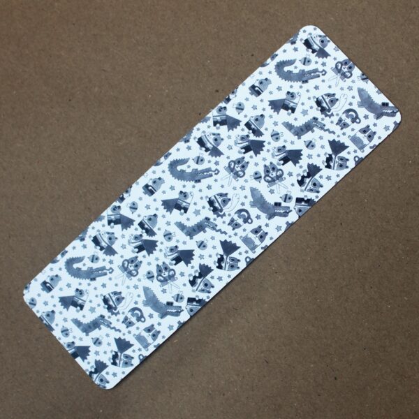 A super cute guinea pig themed bookmark with a black and white pattern, perfect for book lovers!