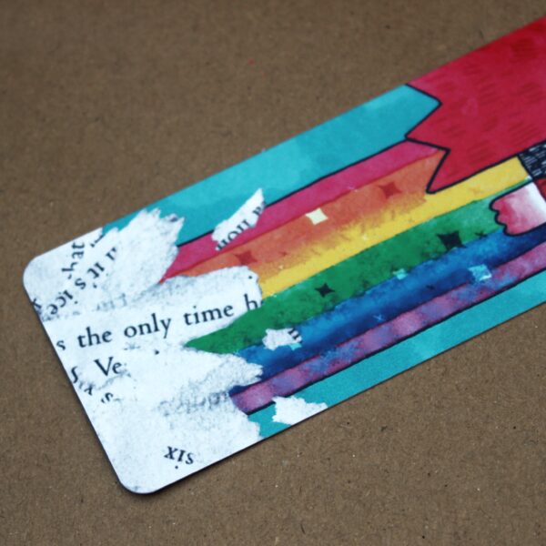 Brighten up your reading with this super cute guinea pig-themed bookmark adorned with a colorful rainbow. It's the perfect way to mark your spot!